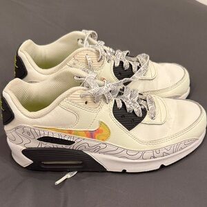 Nike White Sneakers with Multicolor Swoosh and Black Accents